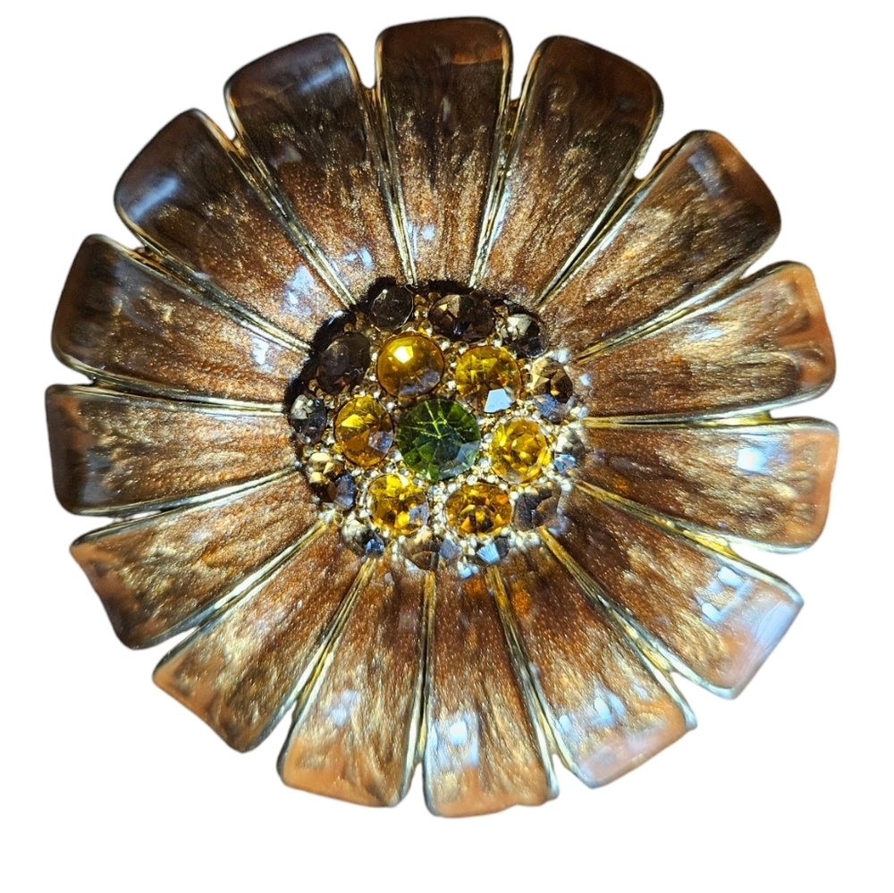 Vintage Metal enameled flower brooch with rhinestone in the center.